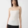 Camiseta sin mangas drapeada de punto plumetis
