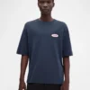 Camiseta Stazione Camiseta con parche con logotipo Camiseta Stazione Camiseta con parche con logotipo