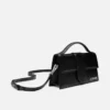 El bolso bandolera grande con solapa Bambino El bolso bandolera grande con solapa Bambino