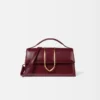 El bolso grande con solapa metálica Bambino Cross-body El bolso grande con solapa metálica Bambino Cross-body