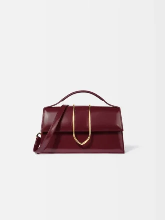 El bolso grande con solapa metálica Bambino Cross-body