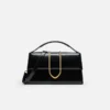 El bolso grande con solapa metálica Bambino Cross-body El bolso grande con solapa metálica Bambino Cross-body