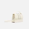 El bolso grande con solapa metálica Bambino Cross-body El bolso grande con solapa metálica Bambino Cross-body
