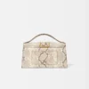 El bolso grande con solapa metálica Bambino Cross-body El bolso grande con solapa metálica Bambino Cross-body
