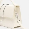 El bolso grande con solapa metálica Bambino Cross-body El bolso grande con solapa metálica Bambino Cross-body