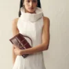 El bolso grande con solapa metálica Bambino Cross-body El bolso grande con solapa metálica Bambino Cross-body