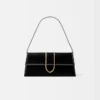 El bolso largo Bambino Bolso largo con solapa metálica El bolso largo Bambino Bolso largo con solapa metálica