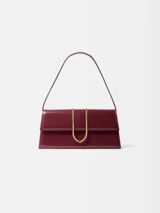 El bolso largo Bambino Bolso largo con solapa metálica