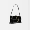 El bolso largo Bambino Bolso largo con solapa metálica El bolso largo Bambino Bolso largo con solapa metálica