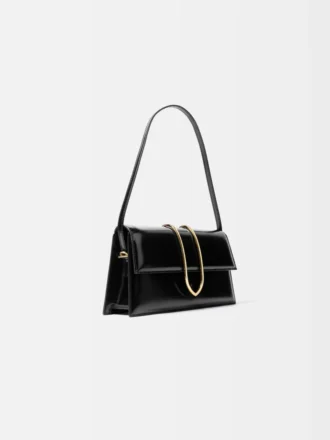 El bolso largo Bambino Bolso largo con solapa metálica