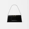 El bolso largo Bambino Bolso largo con solapa metálica El bolso largo Bambino Bolso largo con solapa metálica