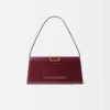 El bolso largo Bambino Bolso largo con solapa metálica El bolso largo Bambino Bolso largo con solapa metálica