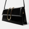El bolso largo Bambino Bolso largo con solapa metálica El bolso largo Bambino Bolso largo con solapa metálica