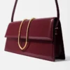 El bolso largo Bambino Bolso largo con solapa metálica El bolso largo Bambino Bolso largo con solapa metálica