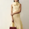 El bolso largo Bambino Bolso largo con solapa metálica El bolso largo Bambino Bolso largo con solapa metálica