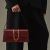 El bolso largo Bambino Bolso largo con solapa metálica El bolso largo Bambino Bolso largo con solapa metálica