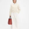 El cárdigan Jacquemus Cárdigan emblemático El cárdigan Jacquemus Cárdigan emblemático