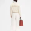 El cárdigan Jacquemus Cárdigan emblemático El cárdigan Jacquemus Cárdigan emblemático