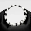 El pequeño bolso de mano Calino Mini Ring El pequeño bolso de mano Calino Mini Ring