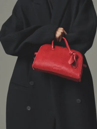 El pequeño bolso de mano Turismo Small