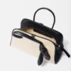 El pequeño bolso de mano Turismo Small
