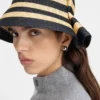 El sombrero Vela Sombrero de rafia plegado
