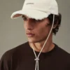Gorra Artichaut Gorra de béisbol con flecos Gorra Artichaut Gorra de béisbol con flecos