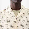 La camisa Jean Camisa de bolos con estampado de patos La camisa Jean Camisa de bolos con estampado de patos