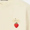 La camiseta de fresas Camiseta con logo y parche de fresas La camiseta de fresas Camiseta con logo y parche de fresas