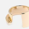 La pulsera J Pulsera con brazalete esculpido en forma de «J»