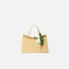 La zanahoria Colgante para bolso con forma de zanahoria anudada La zanahoria Colgante para bolso con forma de zanahoria anudada