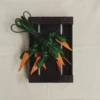 La zanahoria Colgante para bolso con forma de zanahoria anudada La zanahoria Colgante para bolso con forma de zanahoria anudada