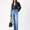 Los pantalones rectos de denim de Nîmes Vaqueros de pierna recta Los pantalones rectos de denim de Nîmes Vaqueros de pierna recta