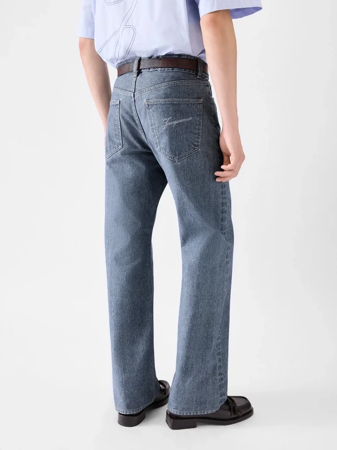 Los pantalones rectos de denim de Nîmes Vaqueros de pierna recta Los pantalones rectos de denim de Nîmes Vaqueros de pierna recta