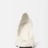 Los tacones Tourni Tacones de salón retorcidos