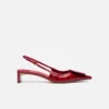 Los zapatos destalonados bajos Duelo Tacones bajos redondos y cuadrados Los zapatos destalonados bajos Duelo Tacones bajos redondos y cuadrados