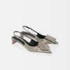 Los zapatos destalonados bajos Duelo Tacones bajos redondos y cuadrados Los zapatos destalonados bajos Duelo Tacones bajos redondos y cuadrados